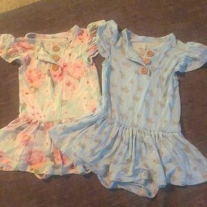 A set of two Posh Peanut Bodysuit Dresses